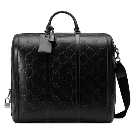 gucci suit garment bag|gucci embossed duffle bag.